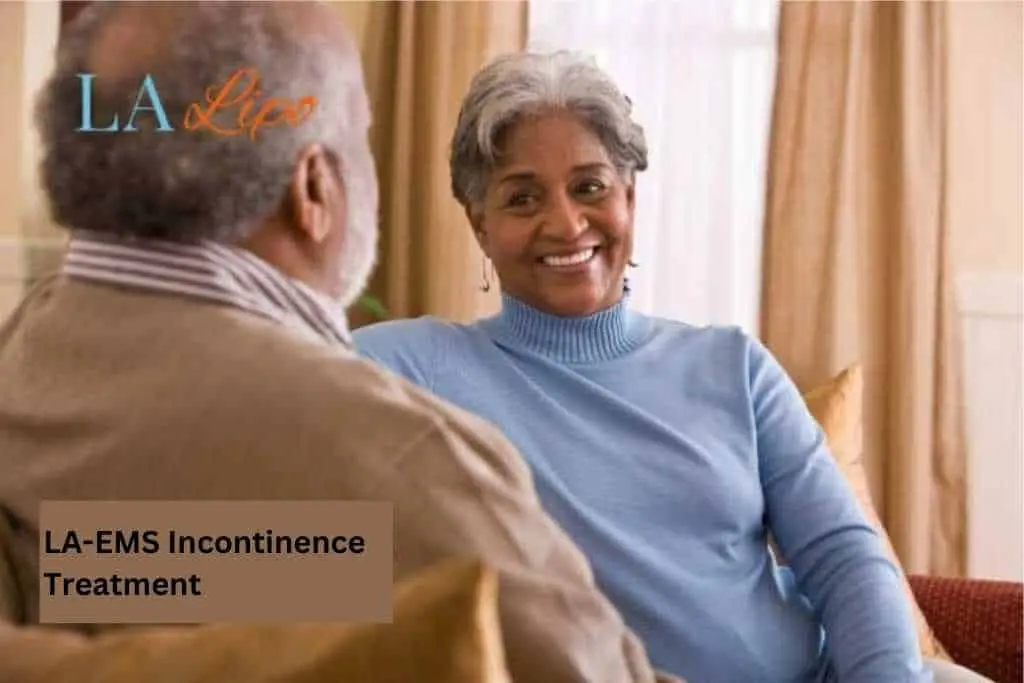 Couple sat smiling at each other - LA-EMS treatment Leominster