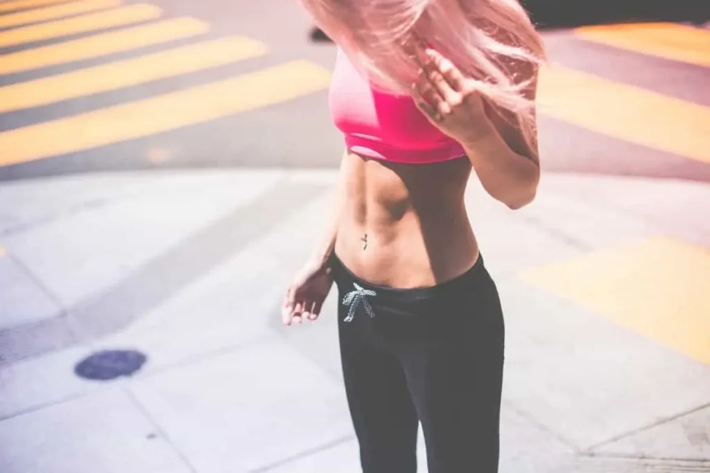 Woman with toned stomach after LA-EMS Body Sculpting Treatment Leominster